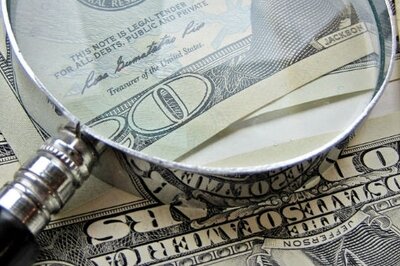 HRMS BYOD Hidden Costs - Money and Magnifying Glass